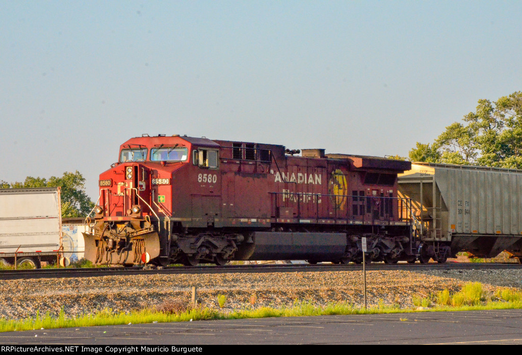 CP AC44CW Locomotive leading a train